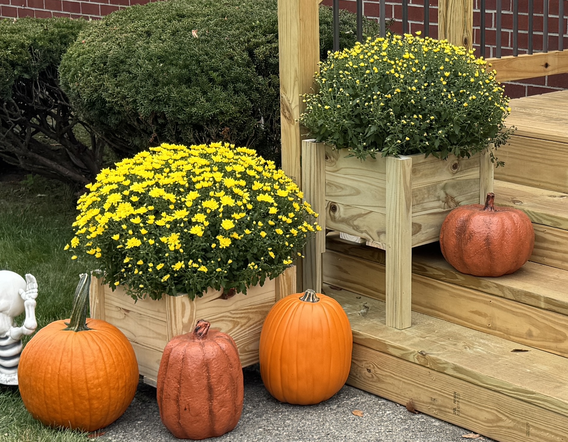 Custom outdoor planter boxes beside a deck