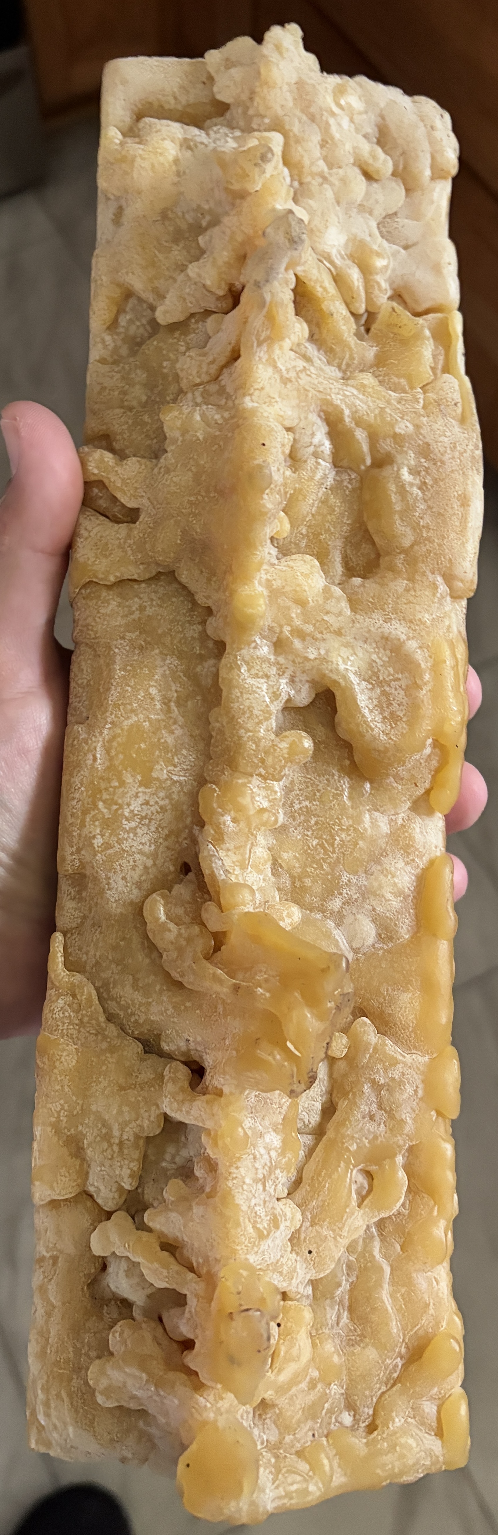 Raw beeswax from a local bee farmer before H&H purifies it